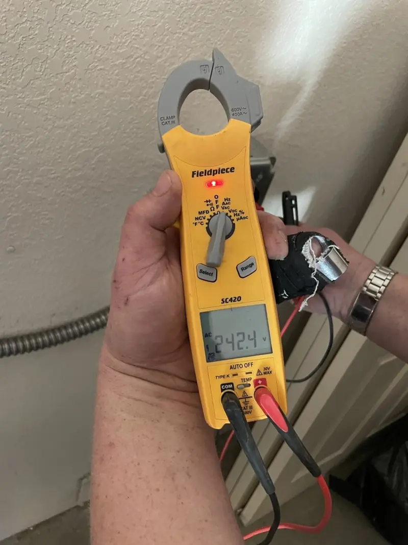 Voltage testing with clamp meter during Circuit Breaker Repair in Heavener